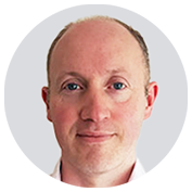 Headshot of Andrew McConaghie.