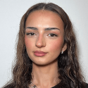 Headshot image of Arbesa Bela