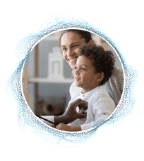 Mother and child together with a health professional.