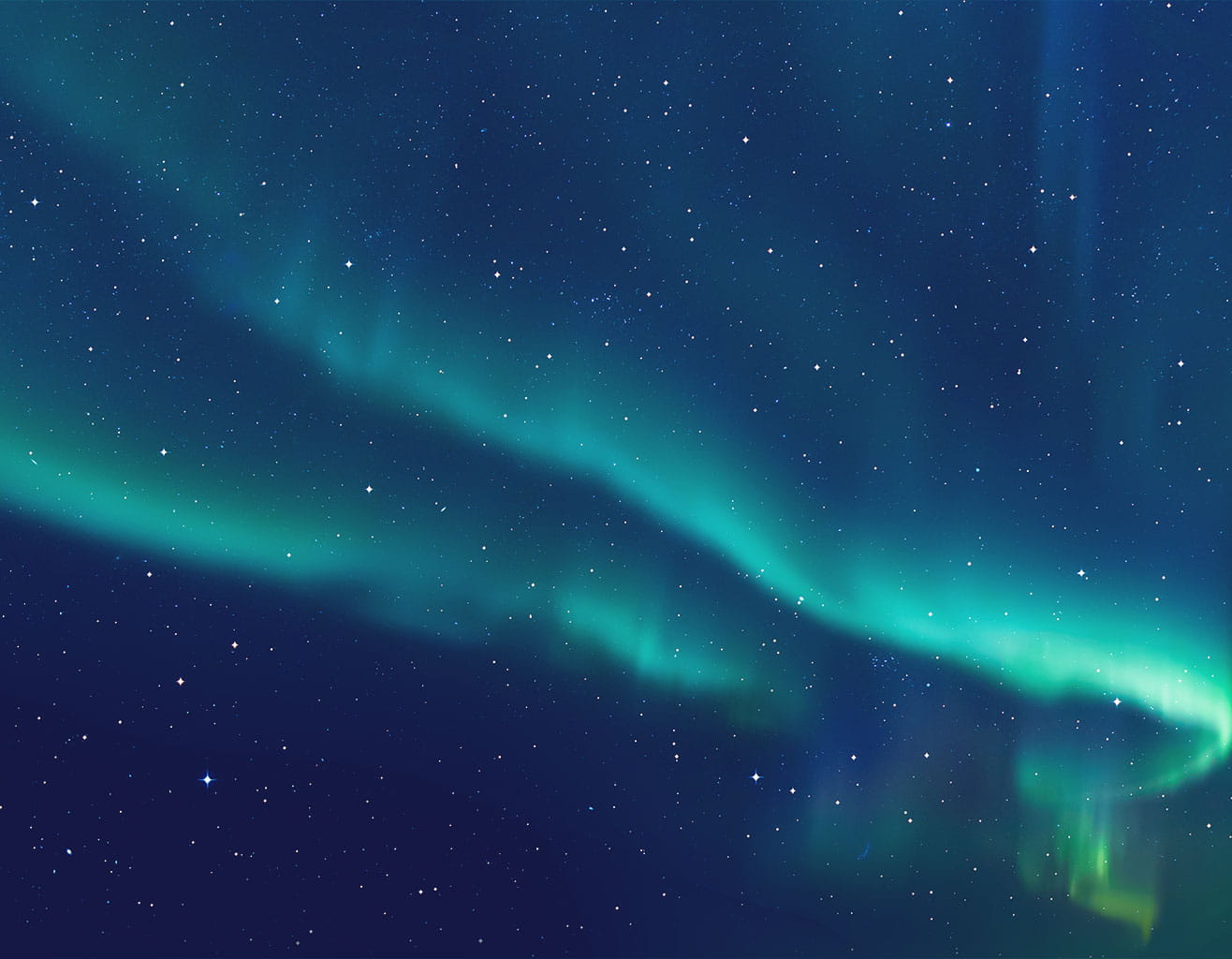 Night sky filled with stars and auroras.