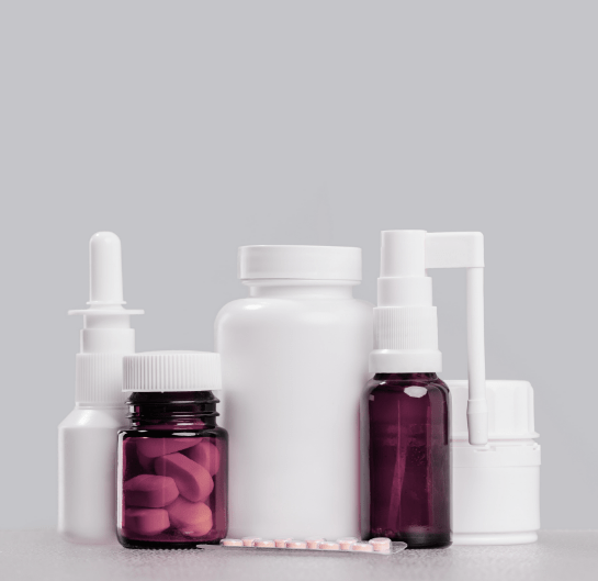 A group of pills and bottles.