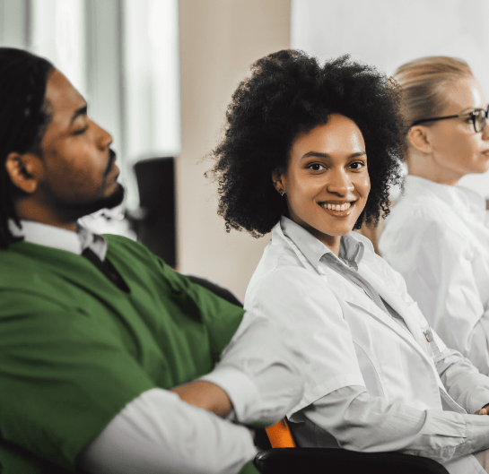 Pharmacy professionals gathered for a presentation.