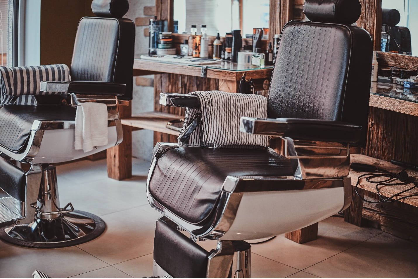 Empty chairs in a barbershop.