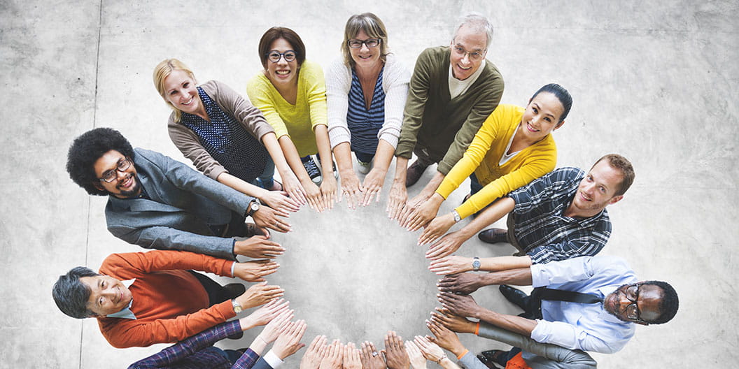 Aerial shot of a group of people together, showcasing diversity. 