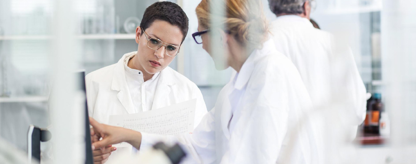 Professionals reviewing the SOP together.