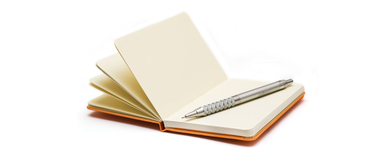Pen on a notebook.