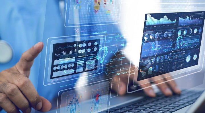 A man pointing at a screen with a background of charts