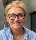 Headshot portrait of Claire Riches