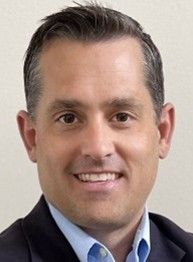 Headshot portrait of Matt Holms