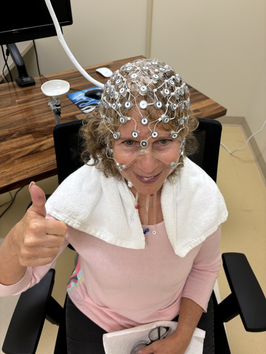 Darcy Grabenstein, hooked up to dozens of electrodes.