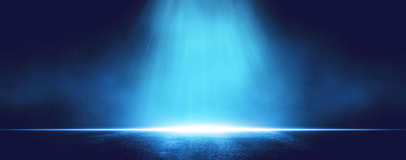 Futuristic blue light background featuring a central spotlight on a textured dark floor.