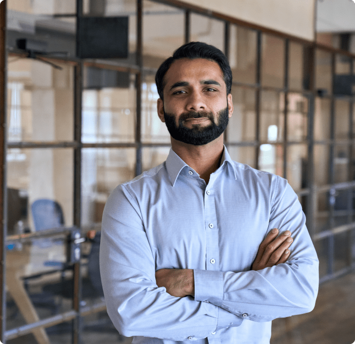 Business professional posing at an office.